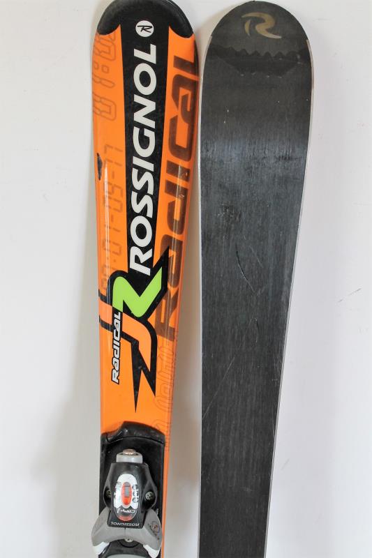 SKI D'OCCASION JUNIOR ROSSIGNOL RADICAL JR ORANGE + FIXATION COMP J